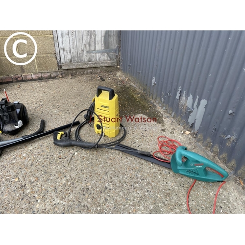 219 - Pressure washer, electric hedger, cleaner, and two tripods