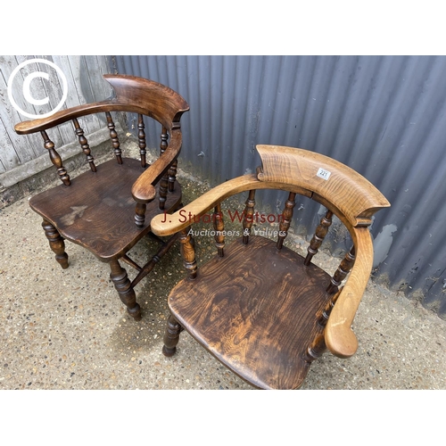 221 - Two antique smokers bow back chairs