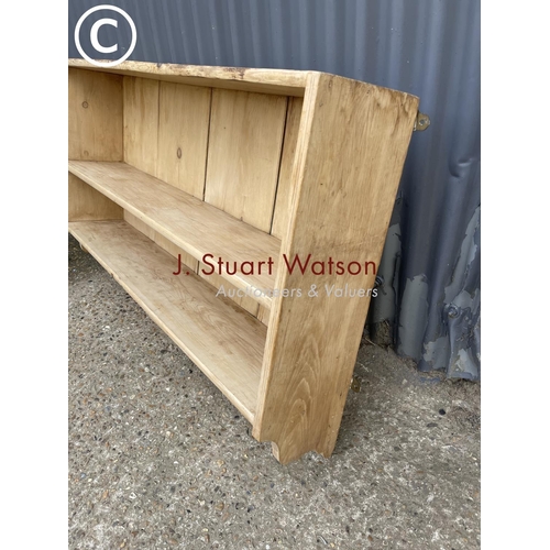 231 - A large rustic pine wall shelf