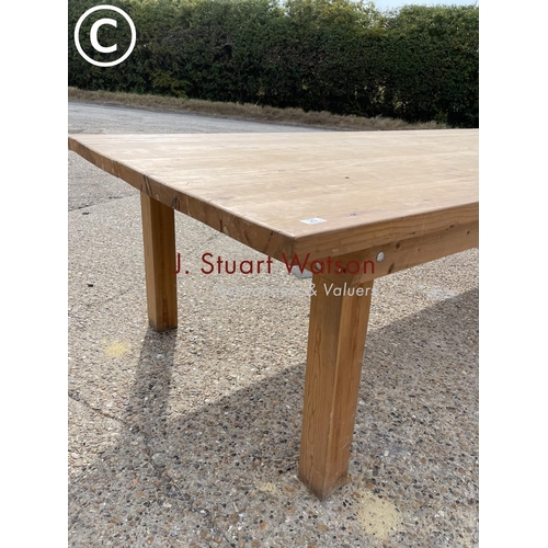 25 - A very large chunky pine farmhouse table 125x300