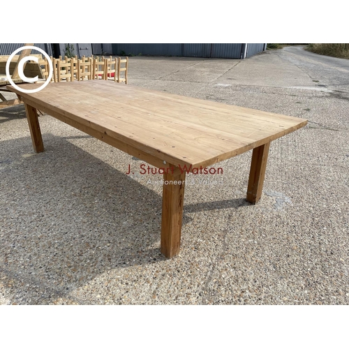 25 - A very large chunky pine farmhouse table 125x300