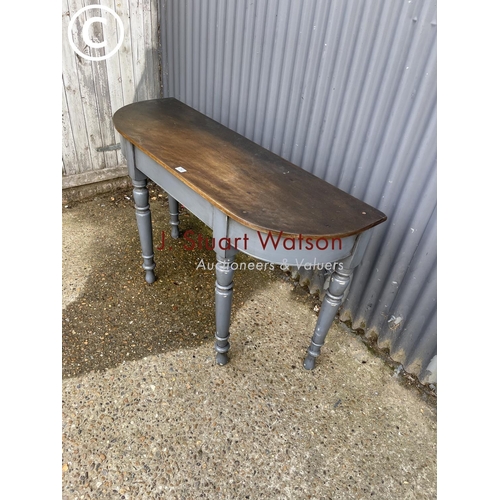 253 - A blue painted hall table  138cm wide