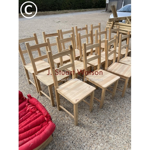 26 - A set of 14 IKEA pine dining chairs with red seat pads