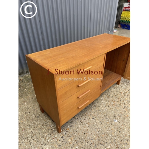 279 - A teak four drawer sideboard labeled Parker furniture