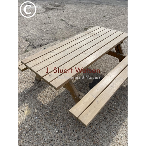 28 - A pub style picnic bench with fold up seats ( as new )