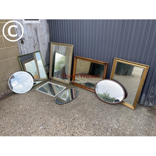 283 - 8 assorted wall mirrors