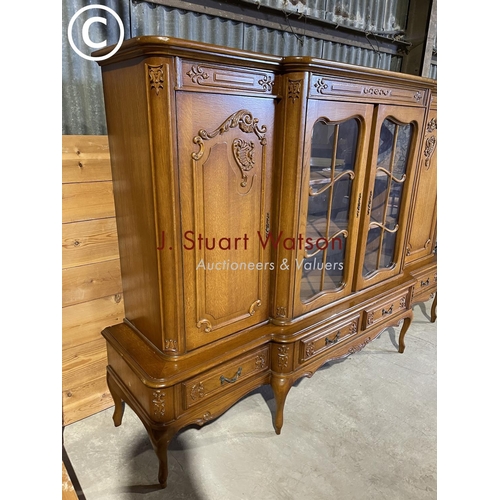 29 - A very large continental oak cabinet in four drawer stand 123x50x155