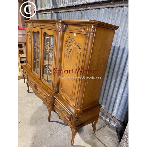 29 - A very large continental oak cabinet in four drawer stand 123x50x155