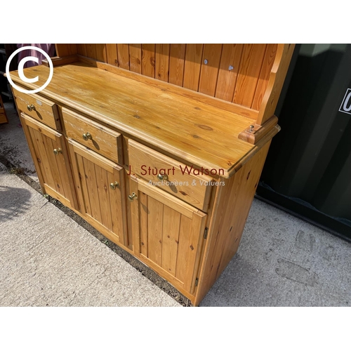 303 - A cottage style pine three drawer dresser