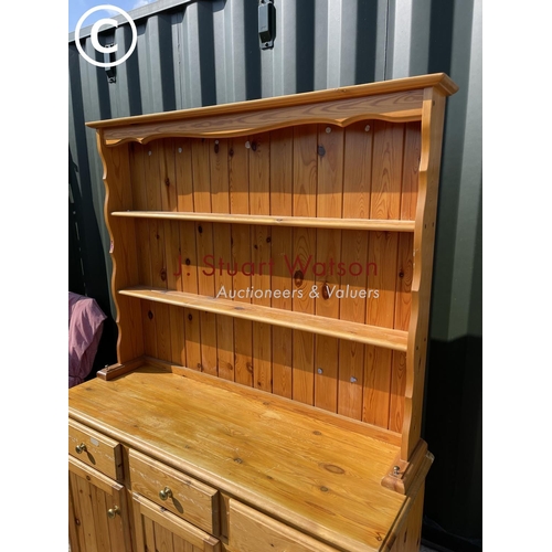 303 - A cottage style pine three drawer dresser