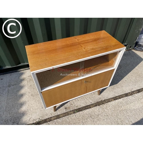 309 - A mid century teak record cabinet with key