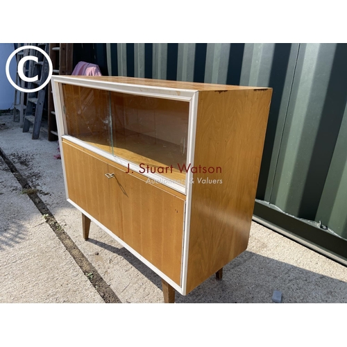 309 - A mid century teak record cabinet with key