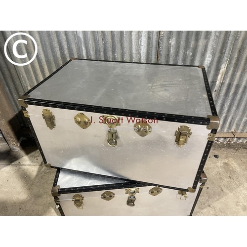 32 - A pair of very large aluminium travelling trunks 100x66x83