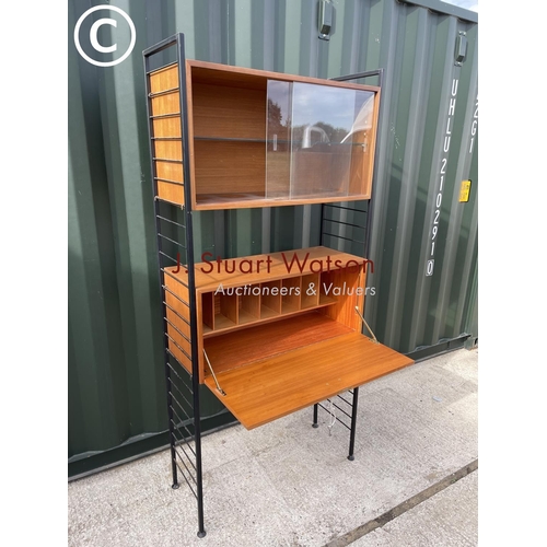 330 - An original mid century staples ladderax home office with glazed bookcase over bureau desk compartme... 