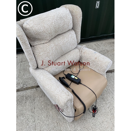 345 - Beige pattern rise and recline electric armchair by primacare still with labels