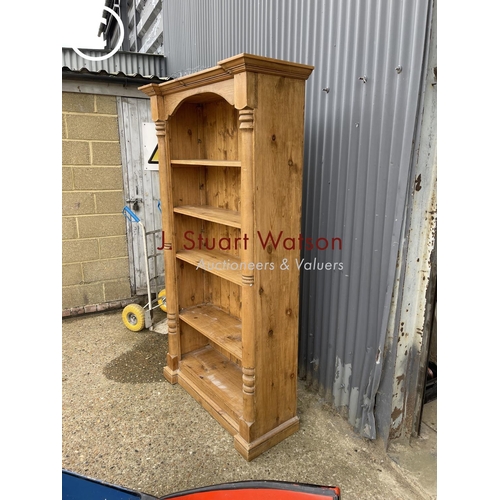 350 - A chunky farmhouse style pine open fronted bookcase