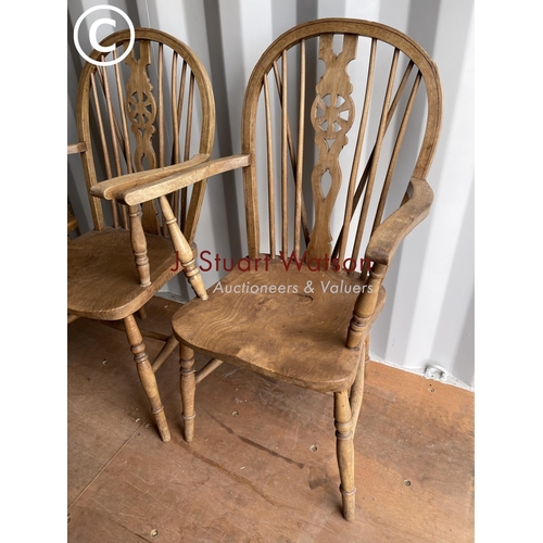 354a - Two wheel back carvers and two stick back chairs