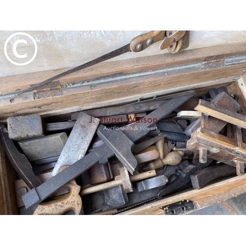 405 - A carpenters box full of wooden planes, marking gauges etc together with four cramps