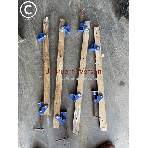 405 - A carpenters box full of wooden planes, marking gauges etc together with four cramps