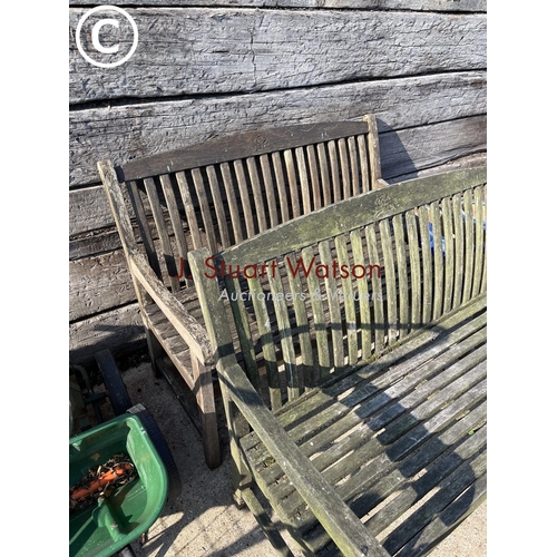 411 - A pair of weathered hardwood garden benches