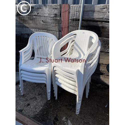 416 - Ten plastic stacking chairs