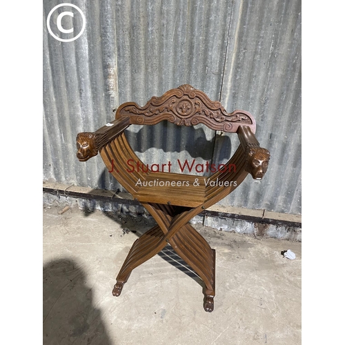 59 - An African style folding x frame chair