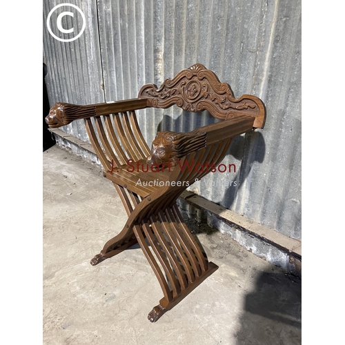 59 - An African style folding x frame chair