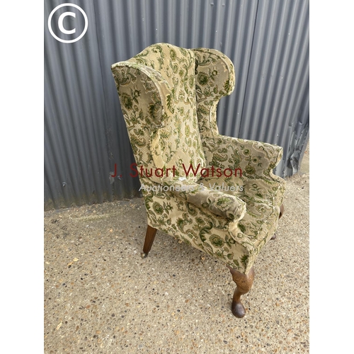 6 - A 19th Century wing back armchair