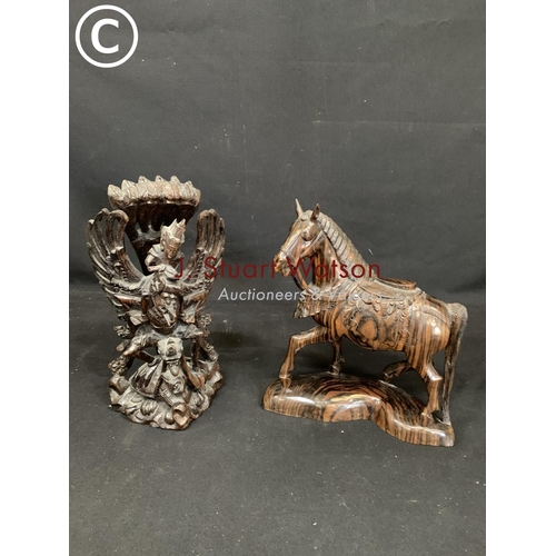 603 - Carved hardwood horse figure and oriental figure, height 31cms