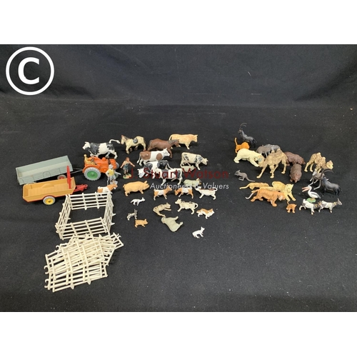 605 - Toy farm with Dinky tractor and trailer and Zoo animals