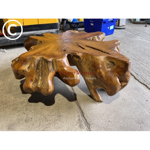 65 - A very large driftwood style hardwood coffee table 105cm diameter