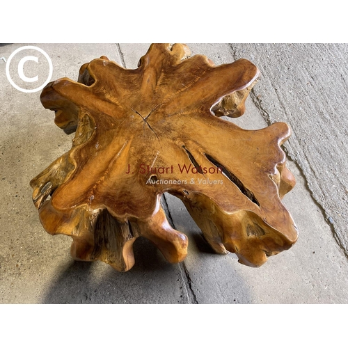 65 - A very large driftwood style hardwood coffee table 105cm diameter