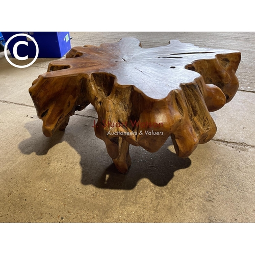 65 - A very large driftwood style hardwood coffee table 105cm diameter