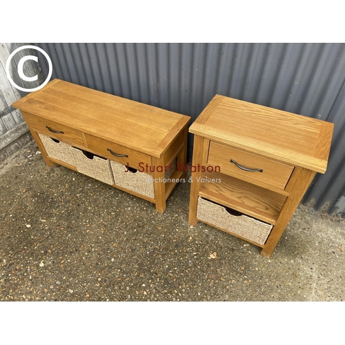 71 - Two matching light oak lounge tables with drawers and basket storage