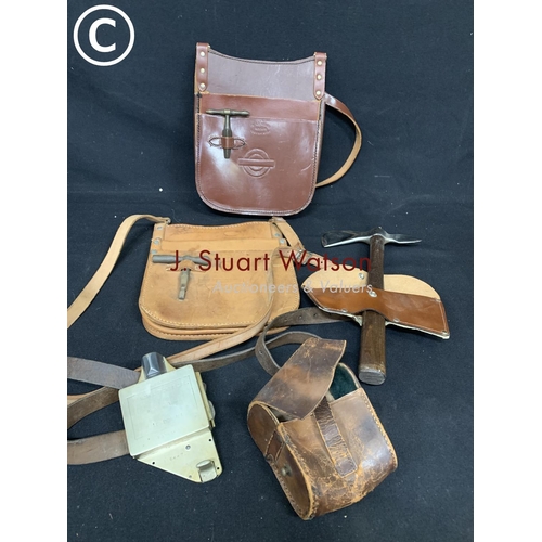 739 - 2 London Underground leather pouches, Patent ticket punch and stainless steel axe