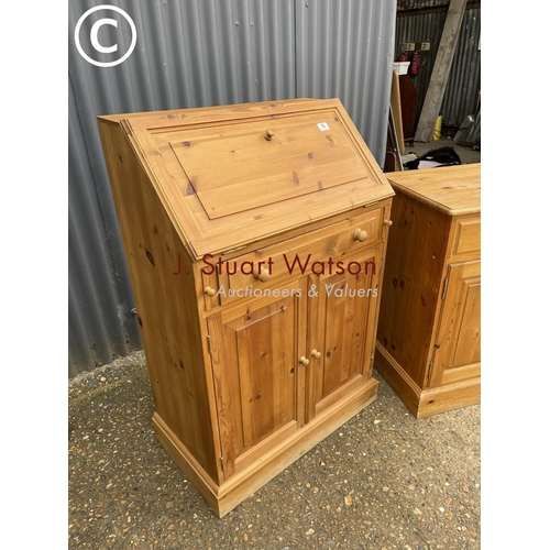 76 - A pine bureau and a small pine sideboard