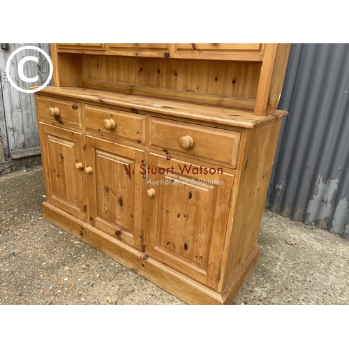 77 - A solid pine three drawer dresser