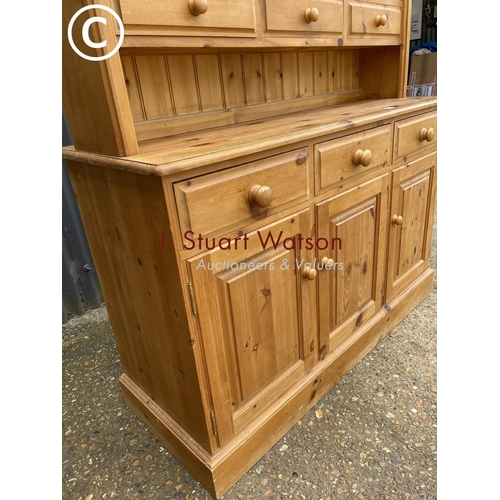 77 - A solid pine three drawer dresser