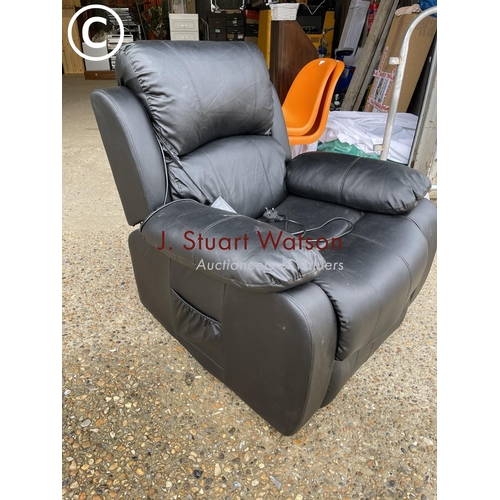 78 - A black leather effect electric rise and recline armchair