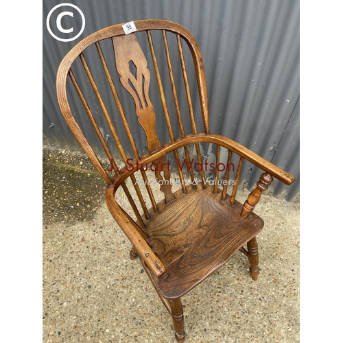 91 - A Windsor style stick back armchair