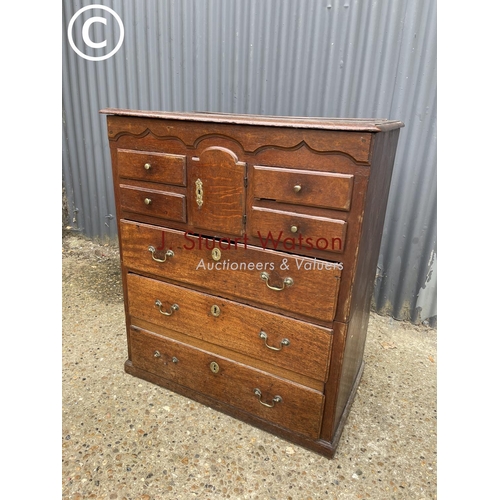 97 - An early oak dresser base (cut to two section) with later oak platerack top