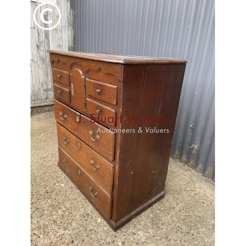 97 - An early oak dresser base (cut to two section) with later oak platerack top