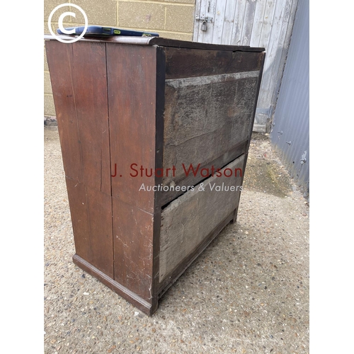 97 - An early oak dresser base (cut to two section) with later oak platerack top