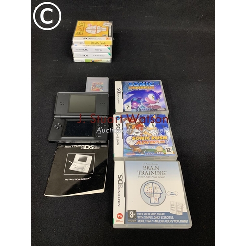 981 - DS lite and 4 games and four emty boxes