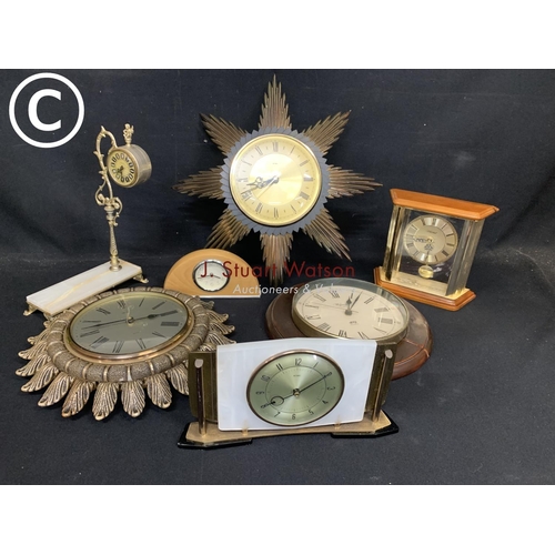 992 - Seven assorted clocks including Metamec starburst and mantel clocks