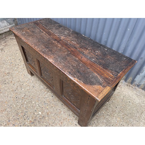 108 - An antique oak blanket box coffer