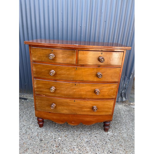 110 - A victorian bow front chest of five drawers