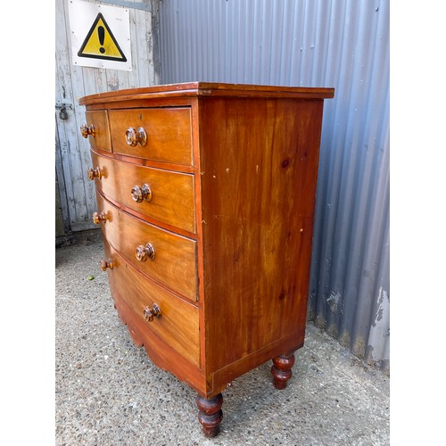 110 - A victorian bow front chest of five drawers