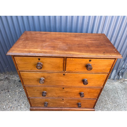 111 - A victorian pitch pine chest of five drawers