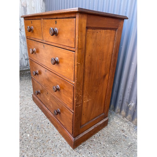 111 - A victorian pitch pine chest of five drawers